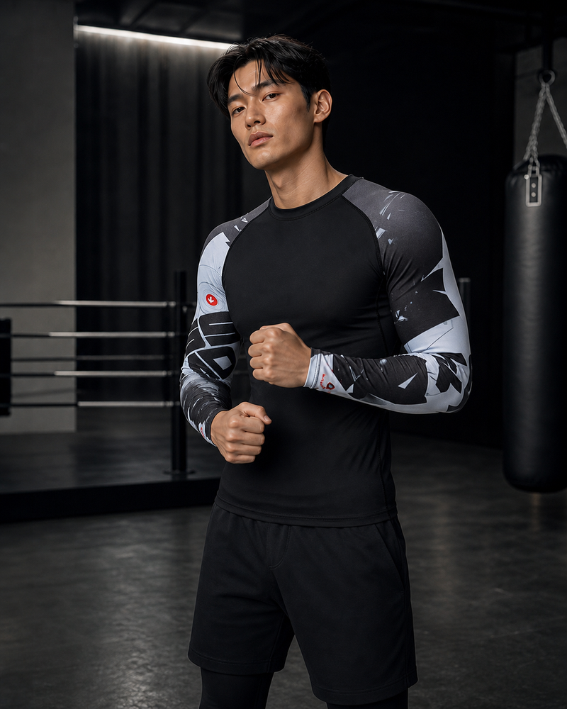 Contour Long-Sleeve Combat Rashguard dark variant on ATHENIS male model